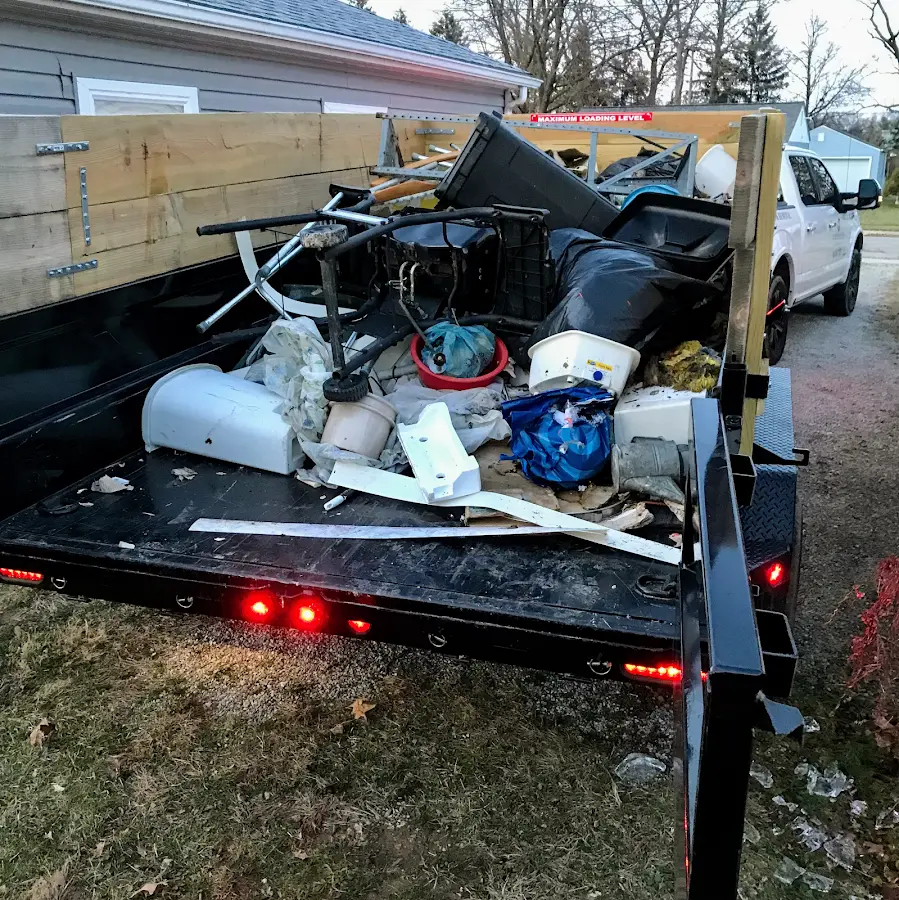 Roll-off dumpster delivered to a residential driveway in Clinton